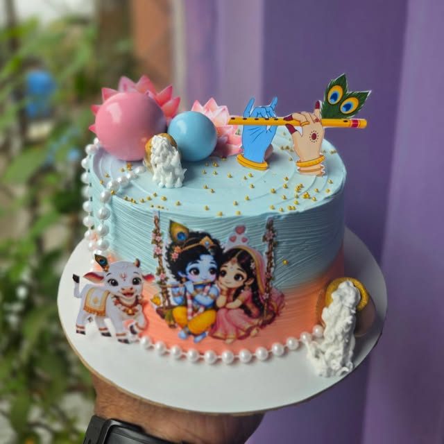Radha Krishna jhula theme cake