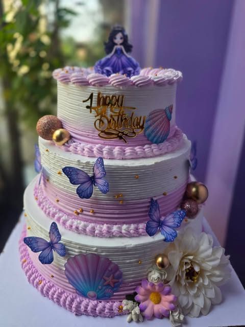 Three-tier princess butterfly cake